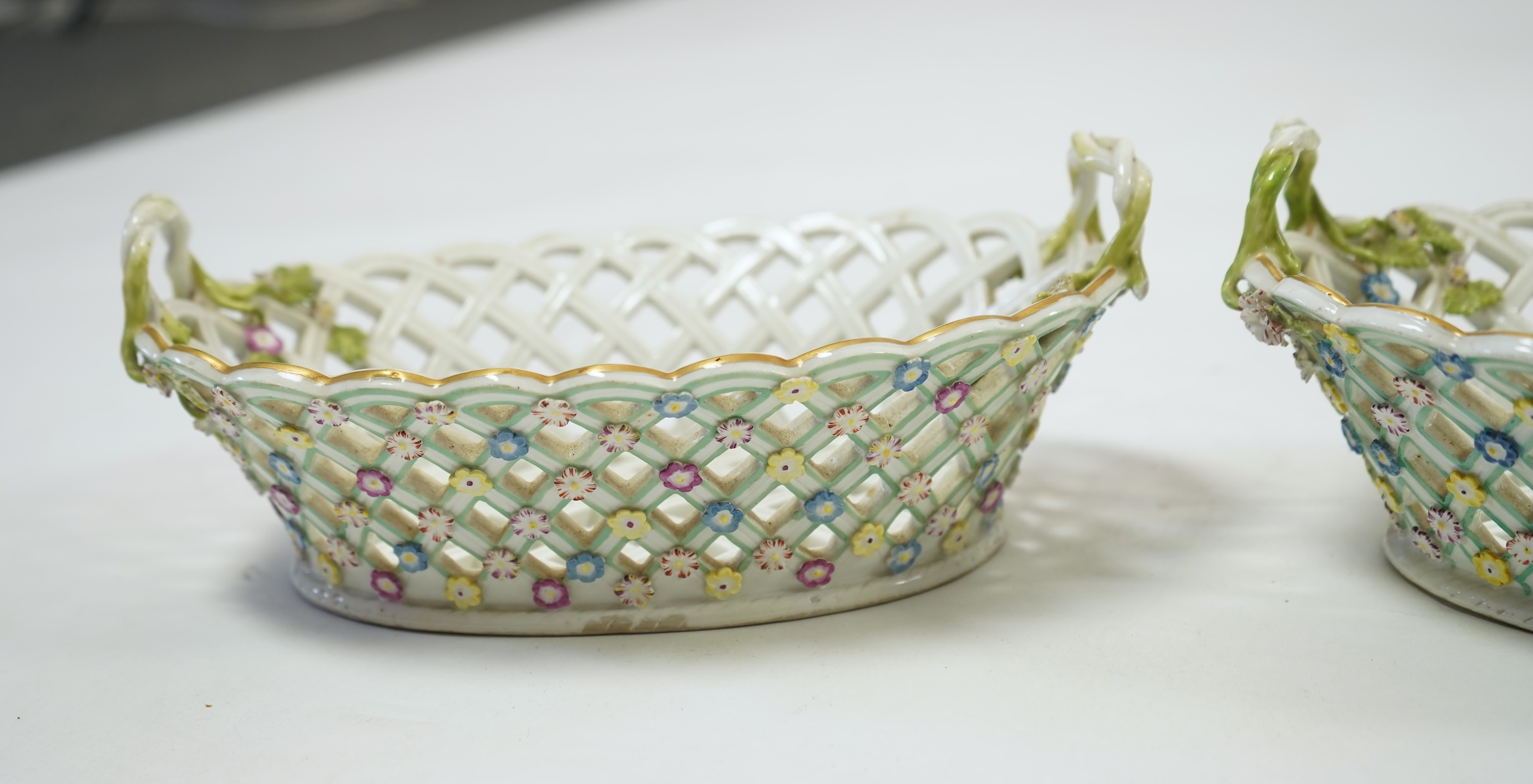 A pair of mid 18th century Meissen porcelain reticulated baskets c.1765